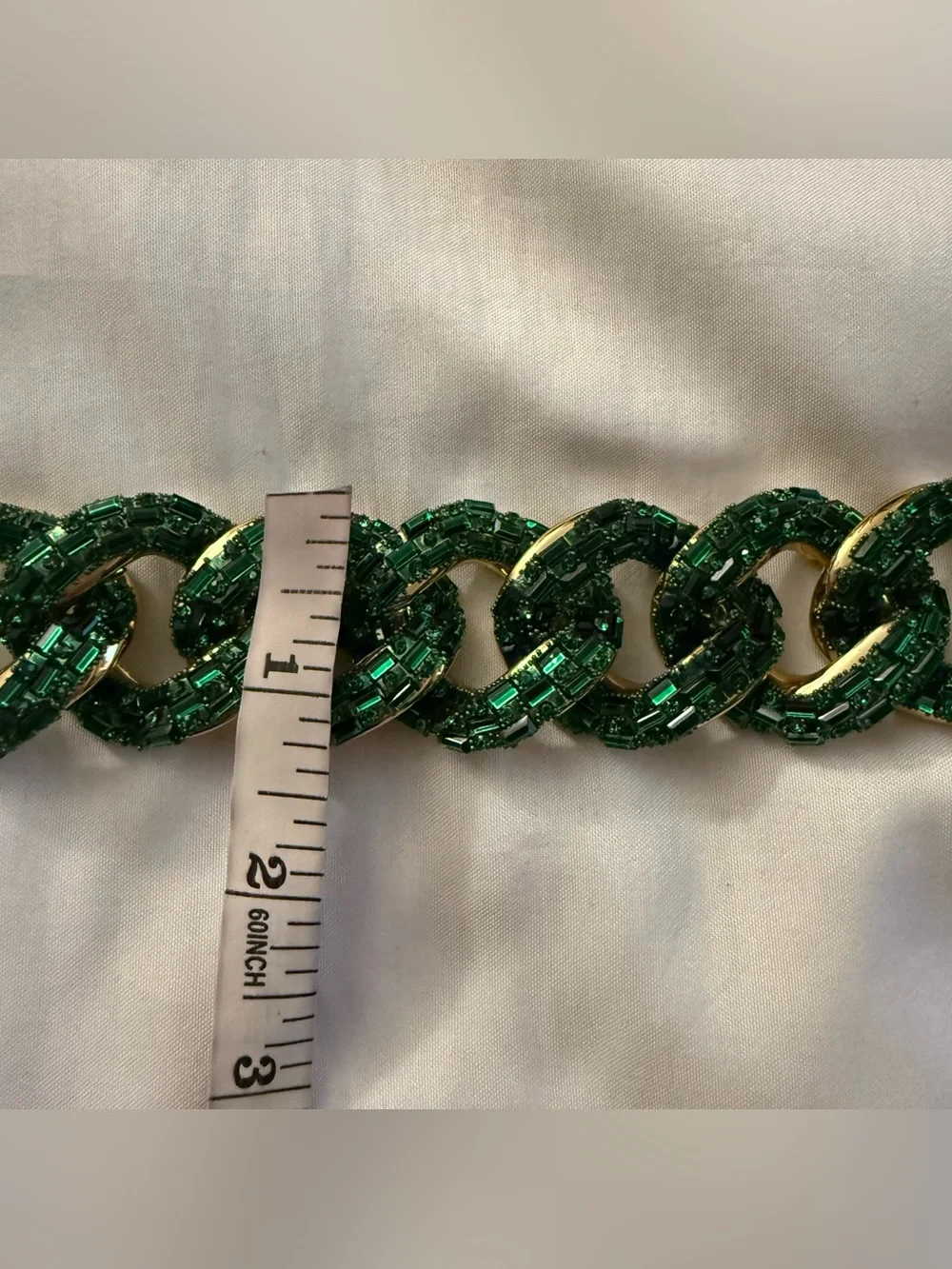 Gold tone metal chain belt with green plastic links